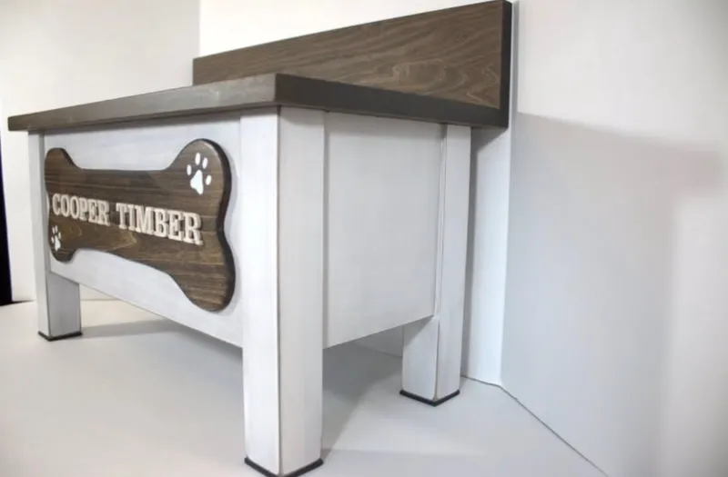Side view of the Cooper Timber stand showing the backsplash, square legs and white distressed paint